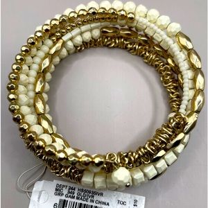 Shel inspired/gold tone bracelet